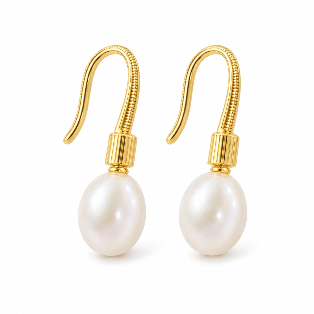 Adriana pearl earrings, 7-8mm white rice pearls beneath ribbed shepherd's hooks and caps