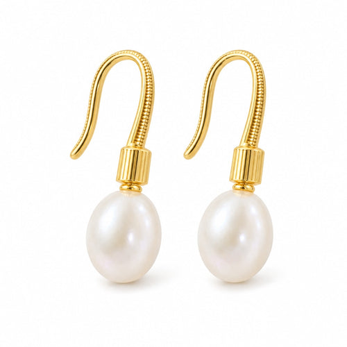 Adriana pearl earrings, 7-8mm white rice pearls beneath ribbed shepherd's hooks and caps