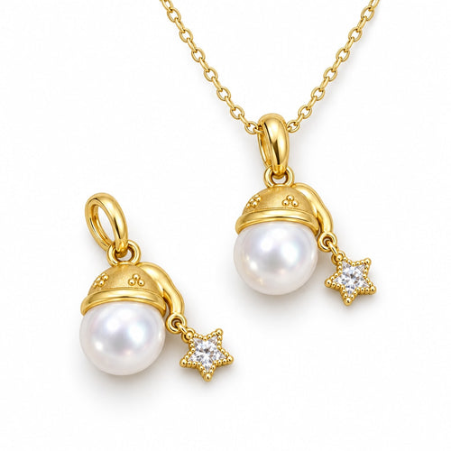 Agnes gold-plated cap pearl pendant necklace with a star charm and round white pearl on white background