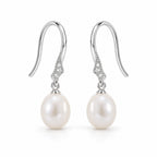 Alba pearl earrings, 7-8mm white rice pearls hanging from shepherd's hooks with small textured accents - second finish