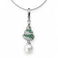 Alma Christmas tree pendant necklace with green and clear crystals and a white pearl in gold-plated silver on white