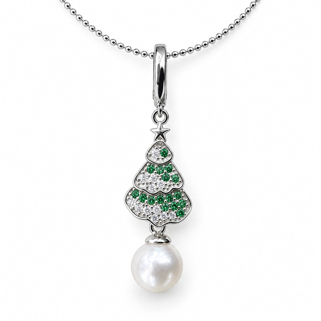 Alma Christmas tree pendant necklace with green and clear crystals and a white pearl in gold-plated silver on white