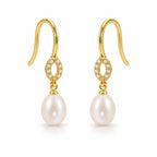 Antonia pearl earrings, 7-8mm white rice pearls hanging from small pavé rings on shepherd's hooks