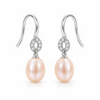Antonia pearl earrings, 7-8mm white rice pearls hanging from small pavé rings on shepherd's hooks - second finish