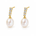 Aurora pearl earrings, graduated four-crystal bars with 7-8mm white rice pearls beneath