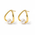 Benedetta pearl earrings, white button pearls inside open teardrop wire frames
