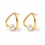 Benedetta pearl earrings, white button pearls inside open teardrop wire frames
