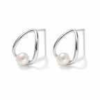 Benedetta pearl earrings, white button pearls inside open teardrop wire frames - second finish