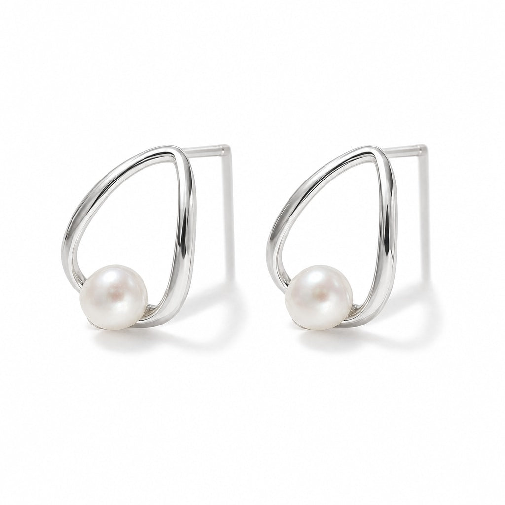 Benedetta pearl earrings, white button pearls inside open teardrop wire frames - second finish