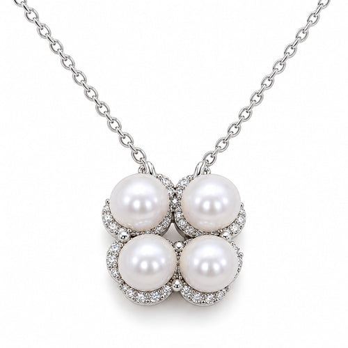 Birgitta four freshwater pearl pendant necklace with crystal pavé crescents in sterling silver on white background