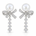Blanche pavé bow pearl drop earrings, 10-11mm white freshwater pearls above crystal bows and graduated crystal tails