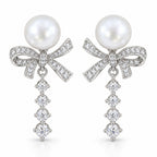 Blanche pavé bow pearl drop earrings, 10-11mm white freshwater pearls above crystal bows and graduated crystal tails