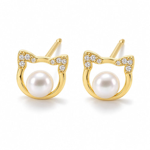 Camilla pearl earrings, cat-face outlines with pavé ears and white button pearls at the center