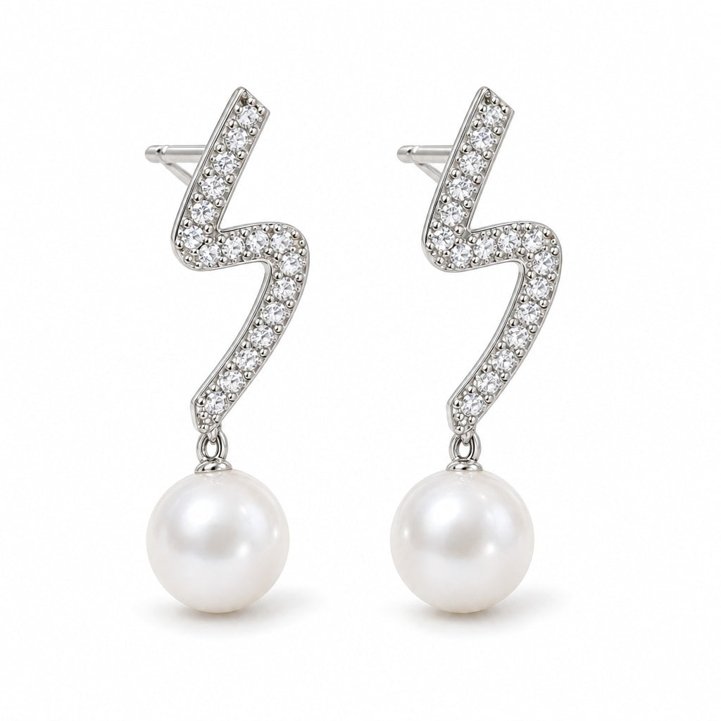Celine pearl earrings, 7-8mm white button pearls hanging from pavé zigzag bars - second finish