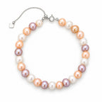 Chiara multicolor freshwater pearl bracelet with silver slider chain and square tag charm, flat lay on light gray