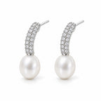 Clemence pearl earrings, 7-8mm white rice pearls fixed beneath curved pavé bars - second finish