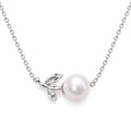 Dagny leaf sprig freshwater pearl station necklace in polished sterling silver on white background