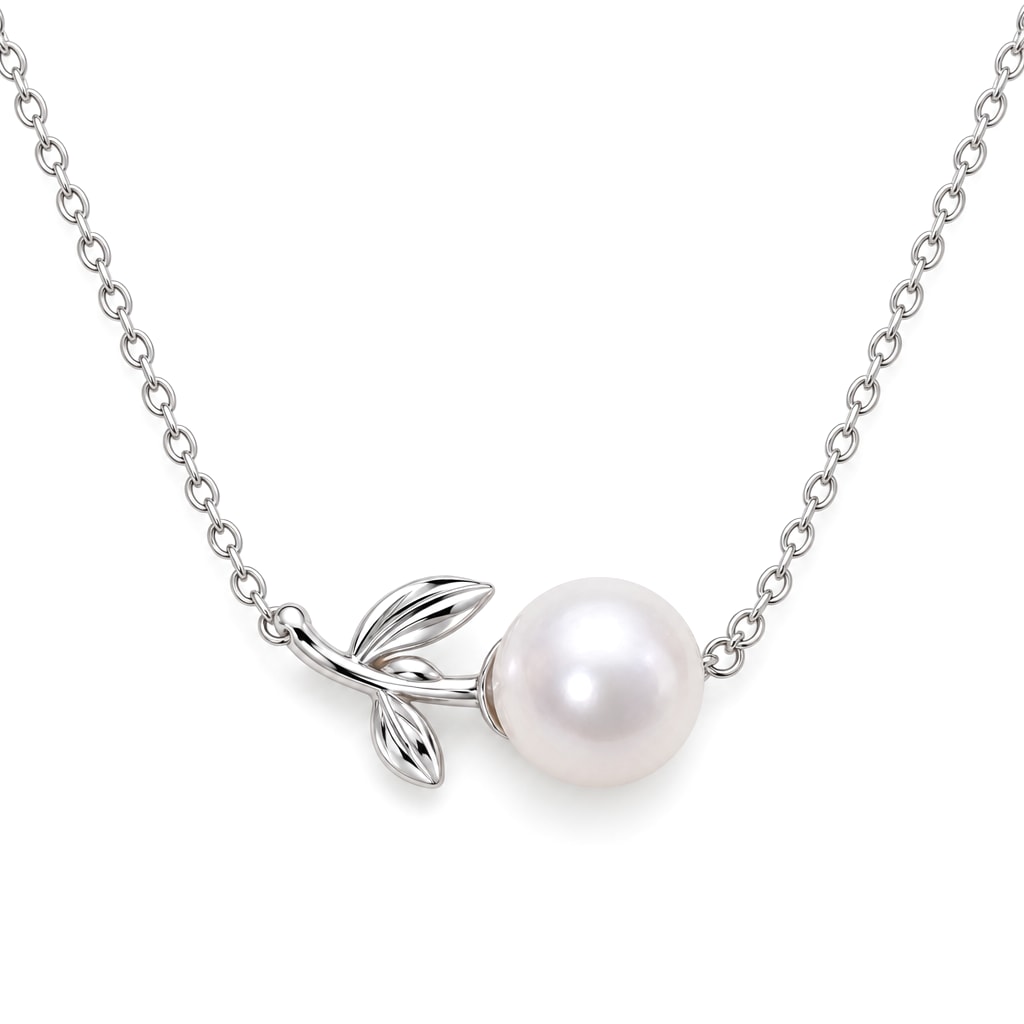 Dagny leaf sprig freshwater pearl station necklace in polished sterling silver on white background