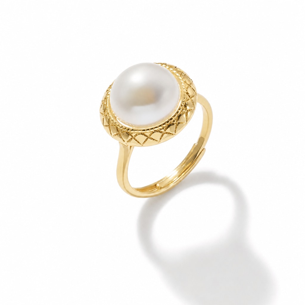 Delia quilted disc pearl ring in gold-plated sterling silver on white background