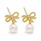 Emilie pearl earrings, rope-loop bows with pavé knots and 7-8mm white button pearls beneath