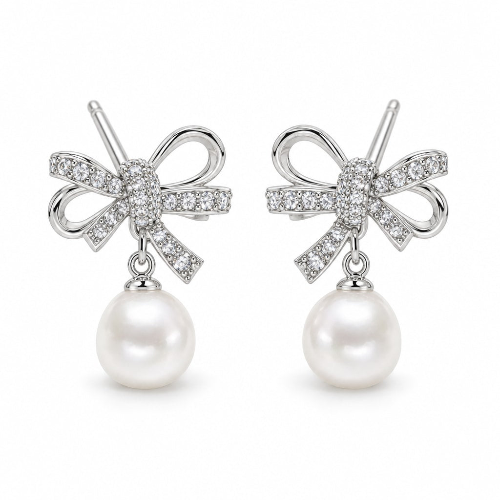 Emilie pearl earrings, rope-loop bows with pavé knots and 7-8mm white button pearls beneath - second finish
