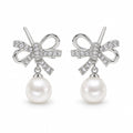 Emilie pearl earrings, rope-loop bows with pavé knots and 7-8mm white button pearls beneath - second finish