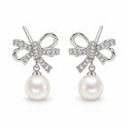 Emilie pearl earrings, rope-loop bows with pavé knots and 7-8mm white button pearls beneath - second finish