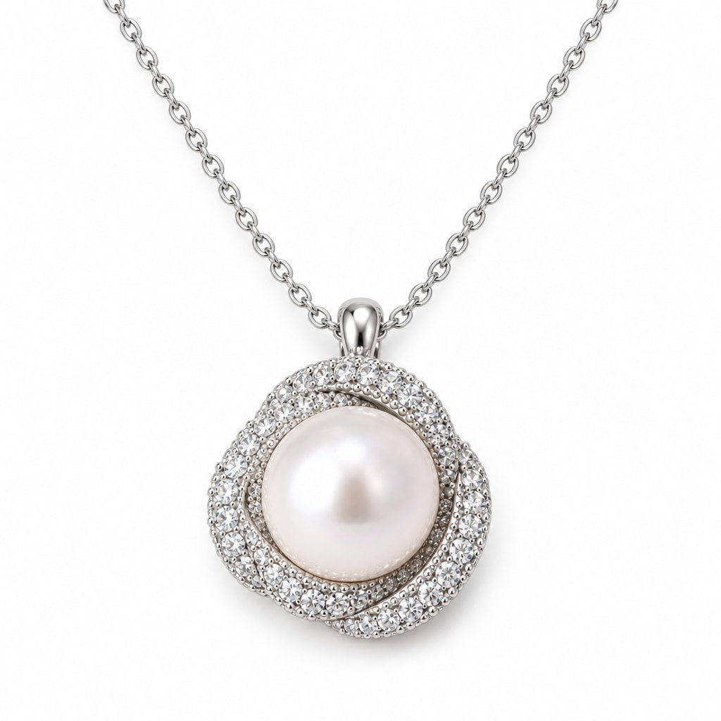 Emmeline pavé knot halo freshwater pearl pendant necklace in sterling silver on white background