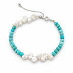 Federica turquoise-blue bead bracelet with two clusters of white keshi pearls, flat lay on white