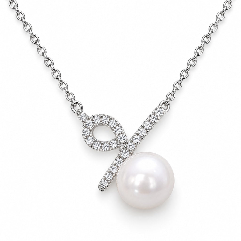 Freya pavé ribbon loop freshwater pearl station necklace in sterling silver on white background