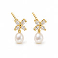 Gabrielle pearl earrings, marquise crystal flowers with 7-8mm white rice pearls hanging beneath