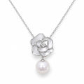 Hedda sculpted rose and freshwater pearl drop pendant necklace in sterling silver on white background