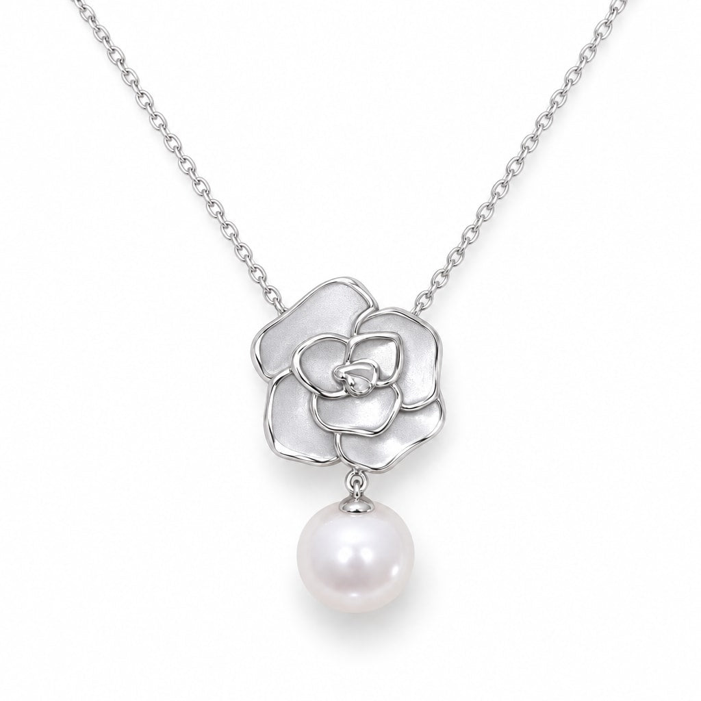 Hedda sculpted rose and freshwater pearl drop pendant necklace in sterling silver on white background