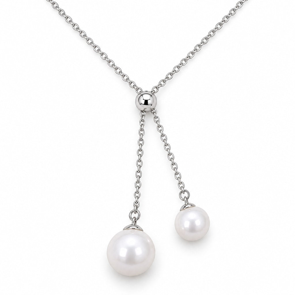 Ingrid double freshwater pearl lariat necklace with a polished slider bead in sterling silver on white background