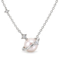 Judith planet pearl pendant necklace with a ringed freshwater pearl and star charm in sterling silver on white background