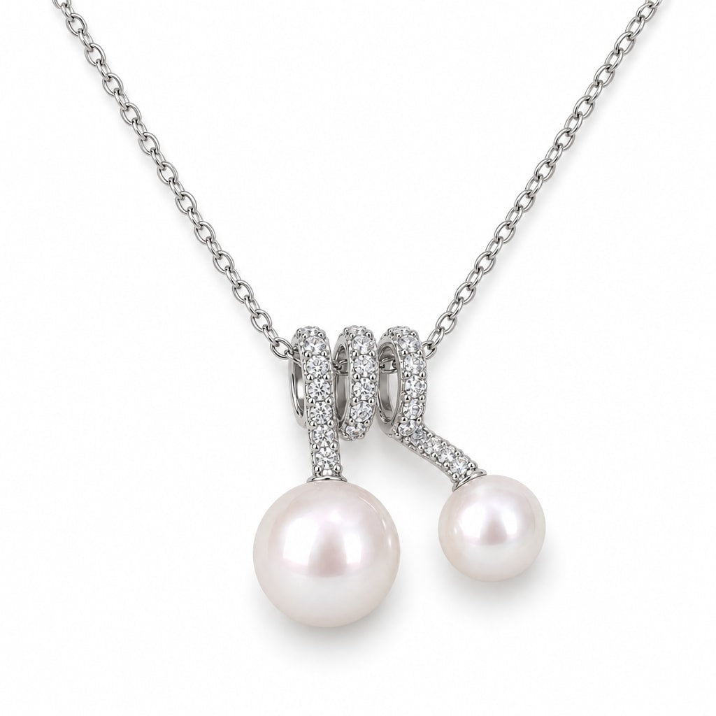 Lillian pavé coil double freshwater pearl pendant necklace in sterling silver on white background