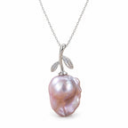 Linnea lavender freshwater pearl pendant necklace on a polished sterling silver twig bail with leaves on white background