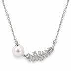 Lydia pavé feather pearl necklace with a round white freshwater pearl in sterling silver on white background