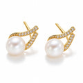 Nadine pearl earrings, 7-8mm white button pearls with pavé bars crossing behind them