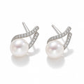 Nadine pearl earrings, 7-8mm white button pearls with pavé bars crossing behind them - second finish