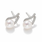 Nadine pearl earrings, 7-8mm white button pearls with pavé bars crossing behind them - second finish
