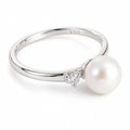 Naomi petite freshwater pearl and CZ ring in sterling silver on white background - second finish