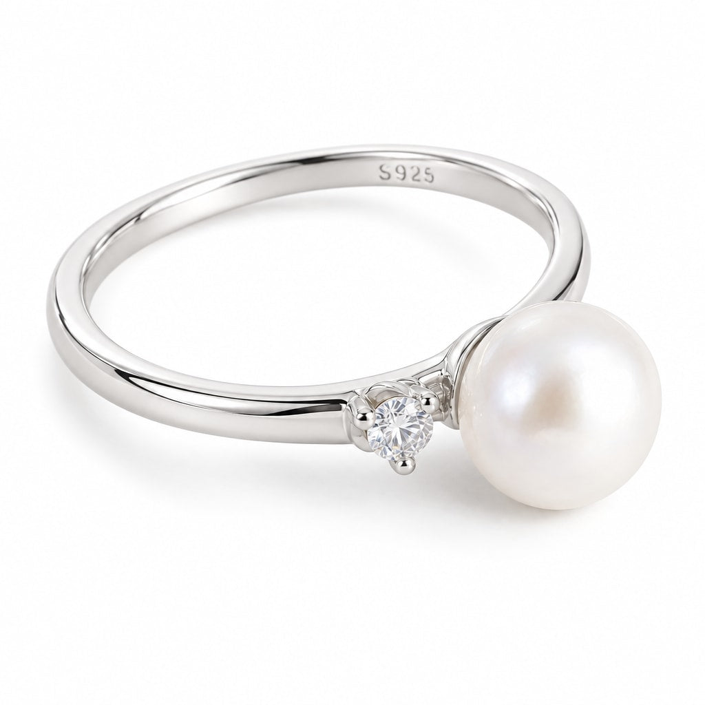 Naomi petite freshwater pearl and CZ ring in sterling silver on white background - second finish