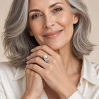 Close-up of a model's hand wearing the Patricia pavé leaf pearl ring in sterling silver