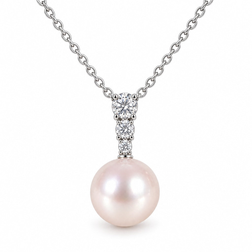 Phoebe three-stone bar freshwater pearl pendant necklace in sterling silver on white background
