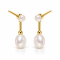 Roxane pearl earrings, 3-4mm button pearls and 7-8mm rice pearls joined by ribbed bars