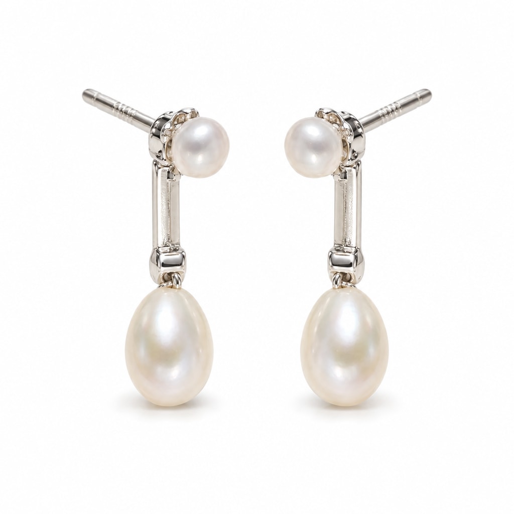 Roxane pearl earrings, 3-4mm button pearls and 7-8mm rice pearls joined by ribbed bars - second finish