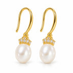 Sandrine pearl earrings, 7-8mm white rice pearls with pavé crown caps on shepherd's hooks