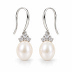Sandrine pearl earrings, 7-8mm white rice pearls with pavé crown caps on shepherd's hooks - second finish
