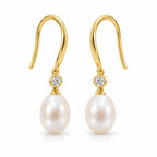 Sidonie pearl earrings, 7-8mm white rice pearls beneath single bezel-set crystals on hooks